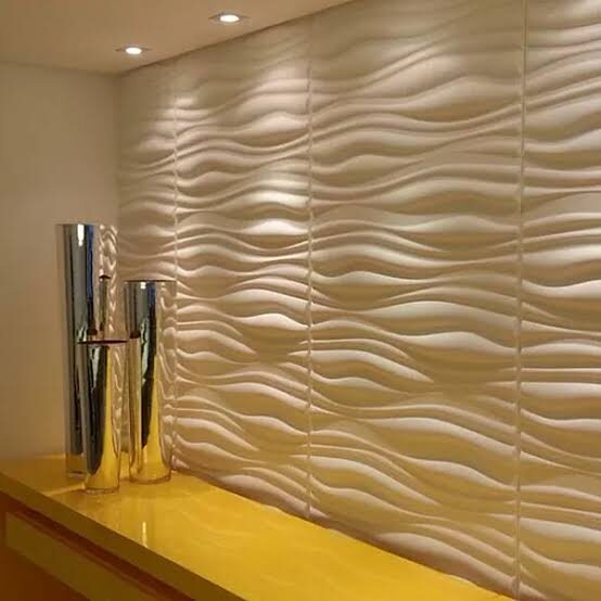 Parede de gesso 3D com ondas iluminada